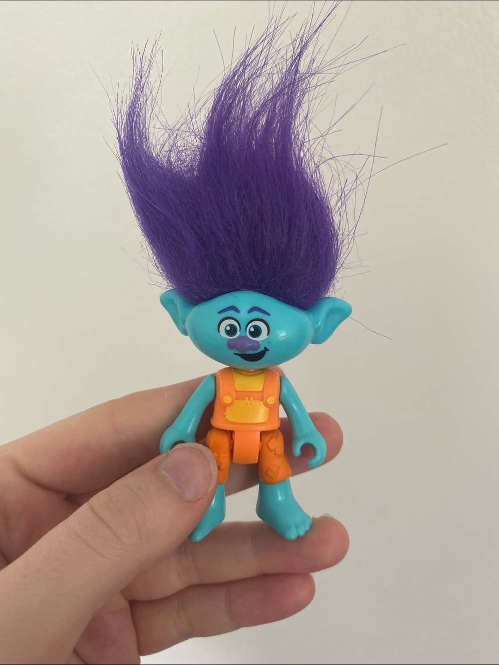 Trolls Brand Blue Troll Figure with Purple Hair and Orange Outfit